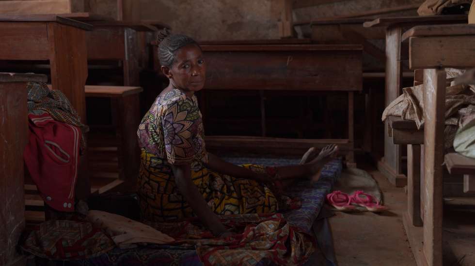 epaselect epa13189613 An Indigenous Pygmy person shelters in a school in Mambasa, Ituri, Democratic Republic of Congo, 24 August 2026. Indigenous Pygmy communities have fled fighting between armed groups to seek refuge in Mambasa. The Ebola outbreak has reached Mambasa, where the local branch of the Nouvelle Societe Civile du Congo (SOCICO) says delays in laboratory results have fueled community resistance to response measures amid persistent insecurity.  EPA/DIEUDONNE DIROLE