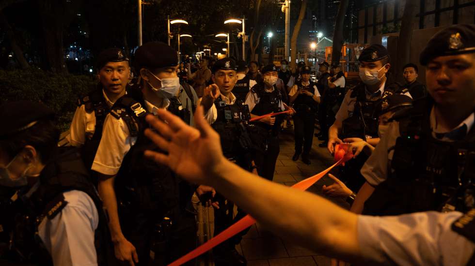 epa10672585 Police set up a cordon at Victoria Park, the traditional venue for a vigil commemorating the 1989 Beijing Tiananmen Square crackdown, in Hong Kong, China, 04 June 2023. The annual candlelight vigil in Victoria Park is cancelled for the fourth year in a row since 2020 as part of the park is being closed for renovation and pro-Beijing organisations will host a carnival on the grounds instead. Hong Kong was the only city on Chinese soil to publicly hold mass memorials in the past three decades to commemorate the 1989 Beijing Tiananmen Square crackdown but police banned the vigils in 2020 and 2021 citing COVID-19 pandemic health concerns and closed down parts of the Victoria park last year due to security concerns.  EPA/BERTHA WANG