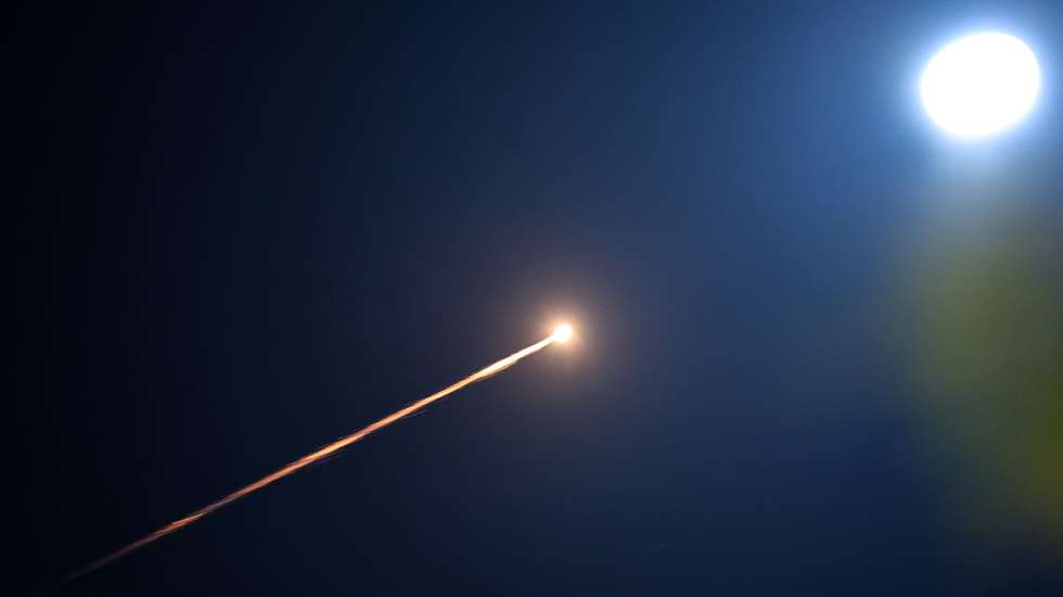 epa12793109 The moon shines as Israel's Iron Dome air defense systems intercept projectiles over Tel Aviv, Israel, 03 March 2026. The Israeli military reported that it detected missiles launched from Iran, part of a retaliatory escalation following the joint US-Israeli strikes that began on 28 February.  EPA/ATEF SAFADI