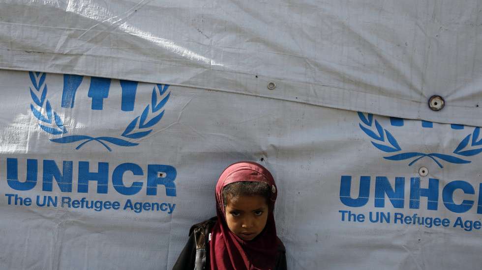 epa10037480 A displaced Yemeni girl stands next to a makeshift shelter amid a heightened food insecurity, at a camp for Internally Displaced Persons (IDPs) on the outskirts of Sana'a, Yemen, 29 April 2022 (issued 27 June 2022). The World Food Programme (WFP) announced on 27 June 2022 that it was forced to reduce aid to millions of people at risk of hunger in war-ravaged Yemen due to a financial shortfall and the knock-on effects of the war in Ukraine. WFP provides monthly food aid to about 13 million out of Yemen's 30-million population. Five million Yemenis are now receiving less than 50 percent of their daily requirement, while another eight million are receiving only 25 percent of their daily needs. Yemen is experiencing a severe food insecurity because of more than seven years of war between the Houthis and the Saudi-backed government.  EPA/YAHYA ARHAB