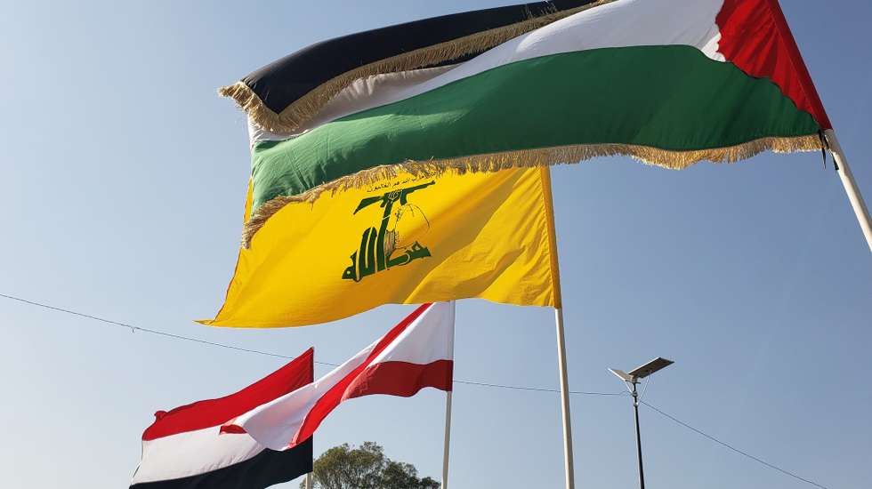 epa11794906 The flags (R-L) of Palestine, Hezbollah, Lebanon and Yemen flutter during an anti-US and anti-Israel protest in Sana'a, Yemen, 27 December 2024. Thousands of Houthi supporters gathered in Sana'a to protest against the United States and Israel a day after Israel airstrikes targeted key facilities in the Yemeni cities of Sana'a and Hodeidah under the control of the Houthis, killing at least six people and wounding 40 others, the Houthi-controlled Health Ministry has reported.  EPA/YAHYA ARHAB
