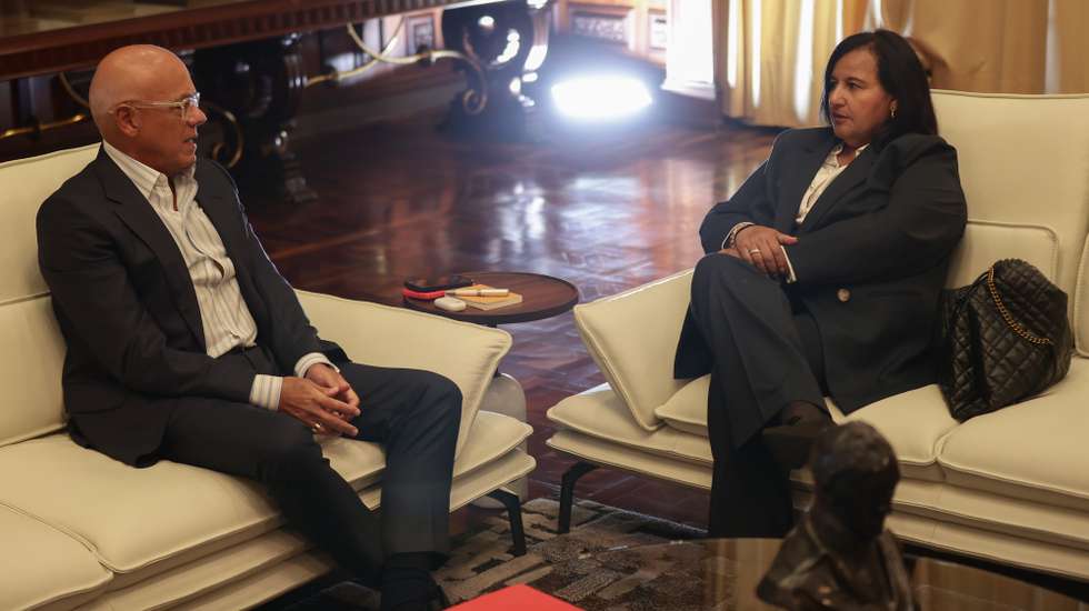 epa13048127 National Assembly President Jorge Rodriguez (L) speaks with former deputy Dinorah Figuera during a meeting in Caracas, Venezuela, 18 June 2026.  EPA/Ronald Pena R