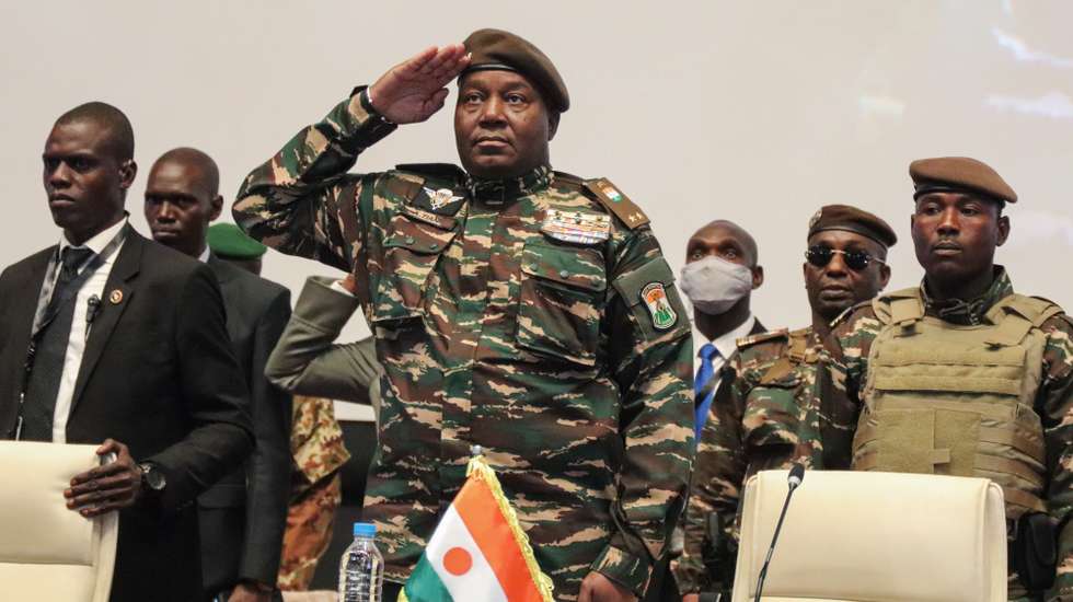epa11462682 Head of the military junta in Niger General Abdourahamane Tchiani (C) salutes at the start of the first ever Alliance of Sahel States summit in Niamey, Niger, 06 July 2024. The junta-leaders in Mali, Burkina Faso, and Niger held their first ever joint summit of a new regional bloc, the Alliance of Sahel States, AES, since seizing power in a series of coups.  EPA/ISSIFOU DJIBO