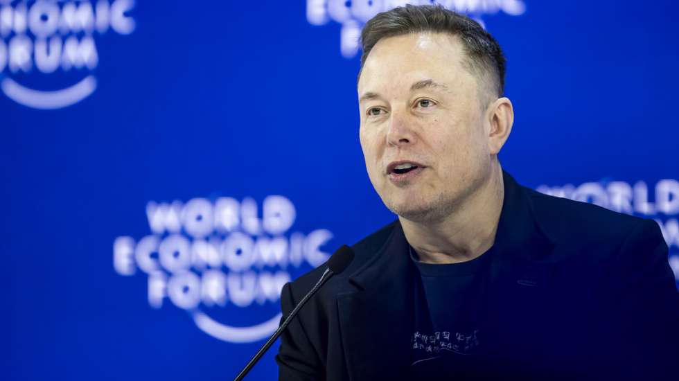 epa12671530 SpaceX and xAI CEO Elon Musk speaks during a panel discussion during the 56th annual meeting of the World Economic Forum (WEF), in Davos, Switzerland, 22 January 2026. The 2026 summit, running from 19 to 23 January and held under the theme 'A Spirit of Dialogue,' brings together global political leaders, corporate executives, and scientists to address international challenges.  EPA/GIAN EHRENZELLER