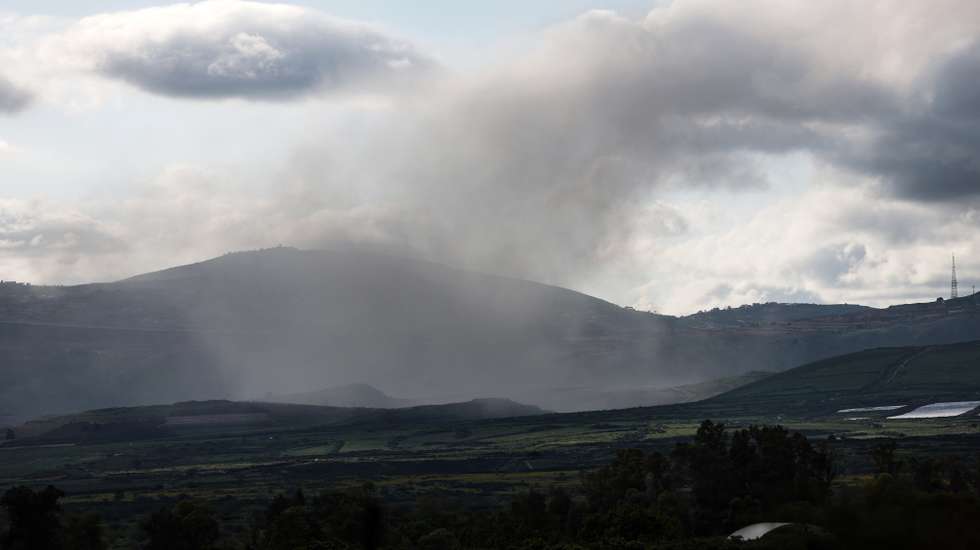 epa12846546 Smoke rises from a hit of a projectile fired by the Hezbollah in the Upper Galilee, northern Israel, 24 March 2026. The Israeli military stated it is conducting strikes across Lebanon targeting Hezbollah infrastructure and personnel.  EPA/ATEF SAFADI