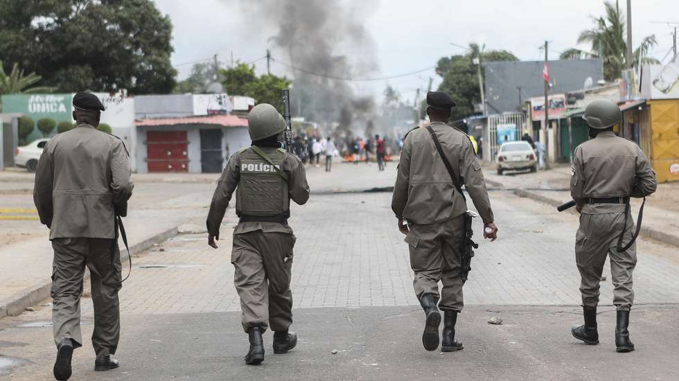 Elements of the Mozambican police intervein to disperse people who were beginning to gather to take part in the peaceful marches called by presidential candidate Venancio Mondlane to repudiate the murder of two supporters, in Maputo, Mozambique, 21 October 2024. The crime occurred Friday on Avenida Joaquim Chissano, in the capital's center. It killed Elvino Dias, Mondlane's lawyer, and Paulo Guambe, a member of Podemos Party. LUISA NHANTUMBO/LUSA