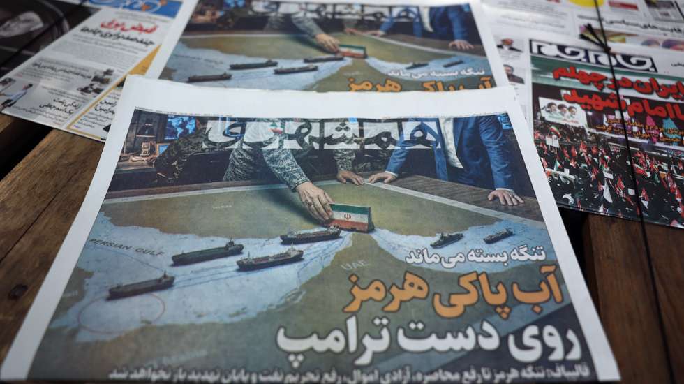 epa13178256 Copies of the Iranian daily newspaper Hamshahri carrying a title that reads in Persian 'The Strait of Hormuz remains closed' on display outside a kiosk in Tehran, Iran, 19 August 2026. Iranian parliament speaker Mohammad Bagher Ghalibaf said that the Strait of Hormuz will remain closed until the United States lifts its blockade and ends sanctions.  EPA/ABEDIN TAHERKENAREH RESTRICTIONS: NO Access Israel Media/Persian Language TV Stations Outside Iran/Strictly No Access BBC Persian/VOA Persian/Manoto TV/Iran International TV. (As mandated by Iran's Directorate General for Foreign Media) --