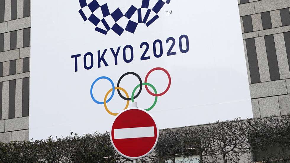 epa08967827 A Tokyo Olympic Games advertising board hangs outside the Tokyo Metropolitan Government Office building in Tokyo, Japan, 27 January 2021. The International Olympic Committee is to hold an Executive Board meeting regarding the Tokyo Olympics that are rescheduled to open on 23 July 2021. Uncertainty is rising as Tokyo and its surrounding prefectures entered a new state of emergency following a spike in Covid019 cases. Public support is fading and more than 80 percent of the population is in favour of another postponement or even a cancellation of the Tokyo Games.  EPA/FRANCK ROBICHON