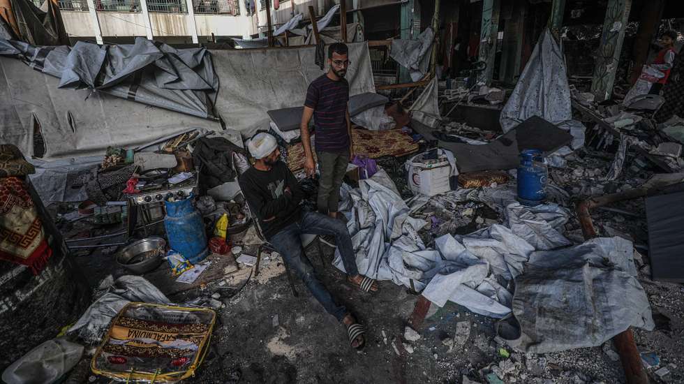 epa12136554 An injured internally displaced Palestinian man sits among the rubble of his family's shelter following Israeli airstrike in Al Jerjawi school in the Al Daraj neighborhood in Gaza City on 26 May 2025. According to the Palestinian Health Ministry in Gaza over 30 Palestinians were killed in the airstrike in the early hours of the morning. More than 53,900 Palestinians have been killed in the Gaza Strip, according to the Palestinian Ministry of Health, since Israel launched a military campaign in the strip in response to a cross-border attack led by the Palestinian militant group Hamas on 07 October 2023, in which about 1,200 Israelis were killed and more than 250 taken hostage.  EPA/MOHAMMED SABER