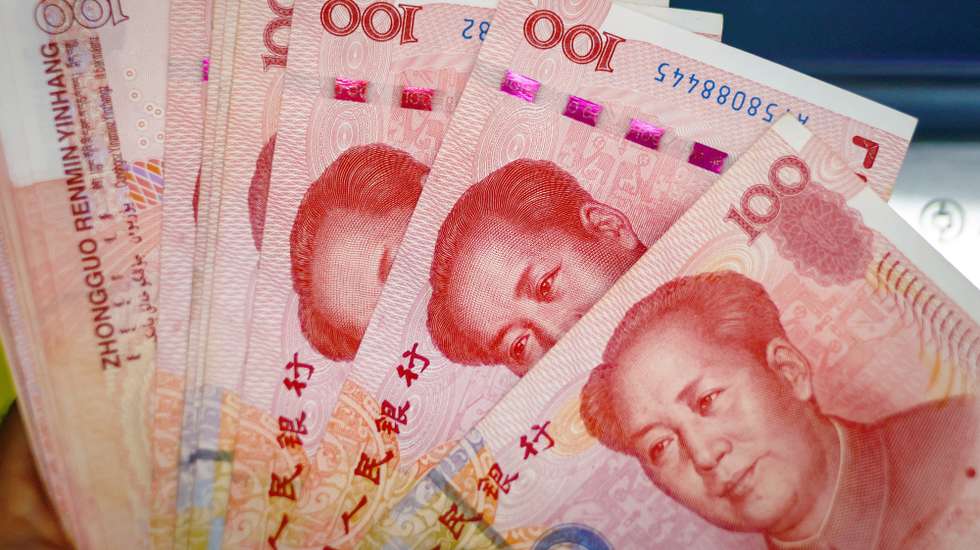 epa10791423 An illustration picture shows banknotes of 100 Chinese Yuan or Renminbi (RMB) in Beijing, China, 09 August 2023. China's consumer price index declined 0.3 percent in July compared to last year, National Bureau of Statistics said.  EPA/MARK R. CRISTINO