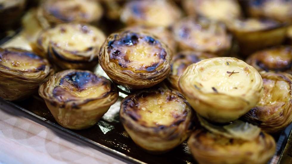 epa07297163 Portuguese custard tarts (Pastel de nata) suits in a Portuguese stand at the International Green Week fair in Berlin, Germany, 18 January 2019. The International Green Week fair runs from 18 to 27 January 2019. This year's partner country is Finland.  EPA/CLEMENS BILAM