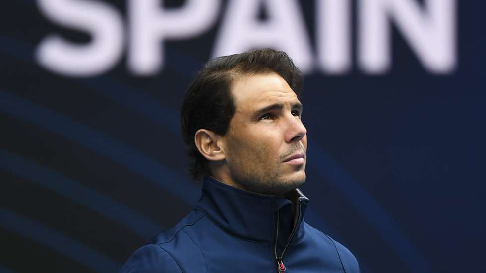 epa08980870 Rafael Nadal of Spain reacts after pulling out of the Round 1 ATP Cup match between Australia and Spain at Melbourne Park in Melbourne, Australia, 02 February 2021.  EPA/DAVE HUNT AUSTRALIA AND NEW ZEALAND OUT  EDITORIAL USE ONLY