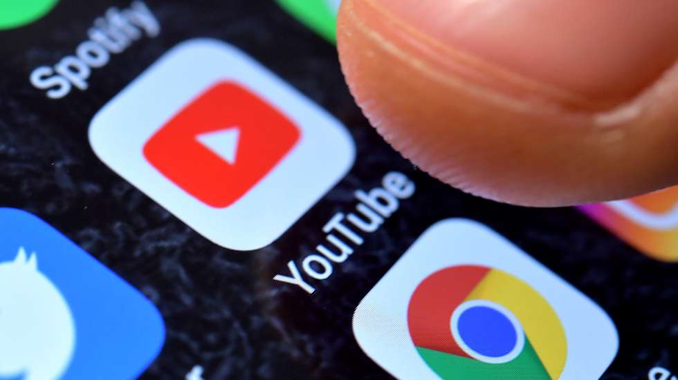 epa08934619 (FILE) - A close-up image shows the YouTube app on an iPhone in Kaarst, Germany, 08 November 2017 (reissued 13 January 2021). YouTube announced on 12 January 2021 that it temporarily suspended US President Donald J. Trump's account for a minimum of seven days citing concerns about the potential of violence following riots at the US Capitol in Washington, DC, USA last week. The Google-owned video-sharing service follows other social media and online services limiting the president's online activities. The suspension temporarily prevents Trump's channel from uploading new videos or live-streaming material, even though the channel continues to be live.  EPA/SASCHA STEINBACH *** Local Caption *** 53883779