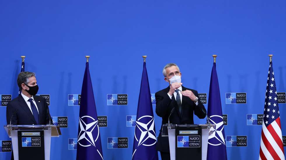 epa09135752 US Secretary of State Antony Blinken (L) looks at Secretary General of the Transatlantic Alliance NATO Jens Stoltenberg (R) during a joint press conference at NATO's headquarters in Brussels, Belgium, 14 April 2021, following a meeting after the United States announced the withdrawal of all its troops from the Afghanistan by September 11. US Secretary of State Antony Blinken said that the moment has come to withdraw troops from Afghanistan and that Washington would work with NATO allies on a 'coordinated' pull-out. NATO allies agreed to start withdrawing of their forces from Afghanistan by May 1.  EPA/KENZO TRIBOUILLARD / POOL