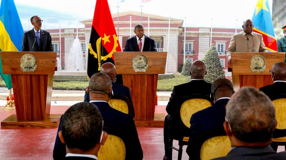 Angolan President, Joao Lourenço (C), receive his counterparts Felix Tshisekedi (R) of Democratic Republic of Congo and Paul Kagame (L) of Rwanda during a summit in Angola on a process to de-escalate tensions that have arisen from a rebel insurgency, Luanda, Angola, 6 July 2022. The Democratic Republic of Congo and Rwanda agreed today to create an 'ad-hoc' observation mechanism and an immediate ceasefire to ease tensions between the two countries, after a meeting mediated by the Angolan President.  AMPE ROGERIO/LUSA