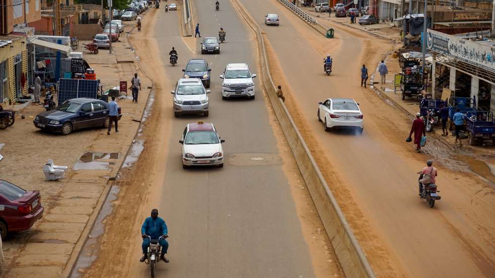 epa10789559 Cars drive on a main road in Niamey, Niger, 07 August 2023. Nigerâ€™s junta closed the countryâ€™s airspace and accused foreign powers of preparing an attack, after the junta defied a deadline to restore ousted President Mohamed Bazoum.  EPA/ISSIFOU DJIBO