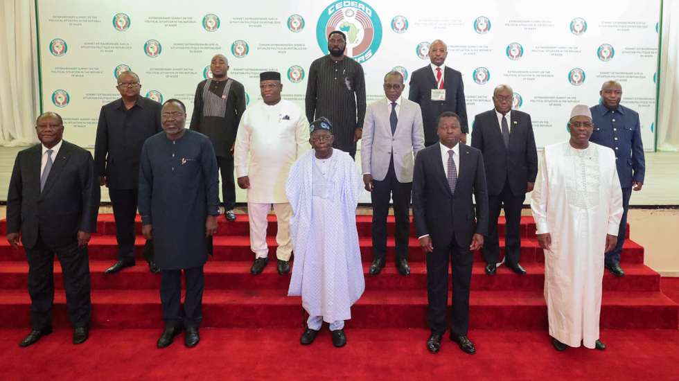 epa10793176 The President of Nigeria Bola Ahmed Tinubu, (C), and leaders of the Economic Community of West African States (Ecowas) meet to discuss the political situation in Niger, in Abuja, Nigeria, 10 August 2023. Two weeks have passed since democratically elected Niger President Mohamed Bazoum, was ousted in a coup led by General Abdourahmane Tchiani, head of the presidential guard.  EPA/STR