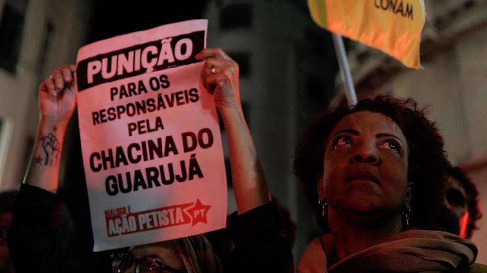 epa10783817 Members of social movements protest in front of the Sao Paulo Public Security Secretariat, in Sao Paulo, Brazil, 03 August 2023. Activists from groups defending the rights of the black population in Brazil demonstrated to denounce the recent 'massacres' carried out by police officers. The protest gathered dozens of demonstrators in front of the headquarters of the Public Security Secretariat of Sao Paulo, to show opposition to the police operation launched last Friday, which caused at least 16 deaths in several cities of the coast of the Sao Paulo region.  EPA/Isaac Fontana