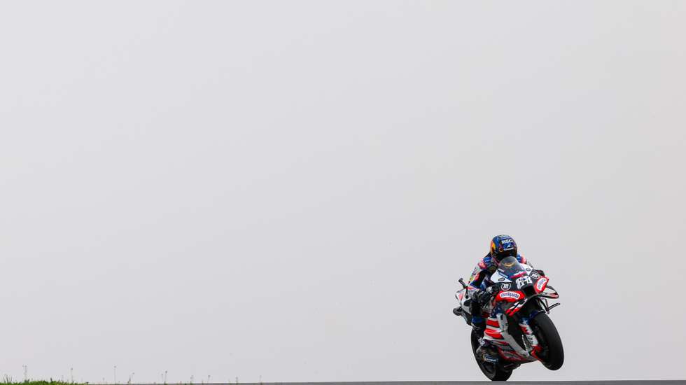 epa11240704 Miguel Oliveira of Portugal and Trackhouse Racing in action during the warm up session of the Motorcycling Grand Prix of Portugal, in Portimao, Portugal, 24 March 2024.  EPA/JOSE SENA GOULAO
