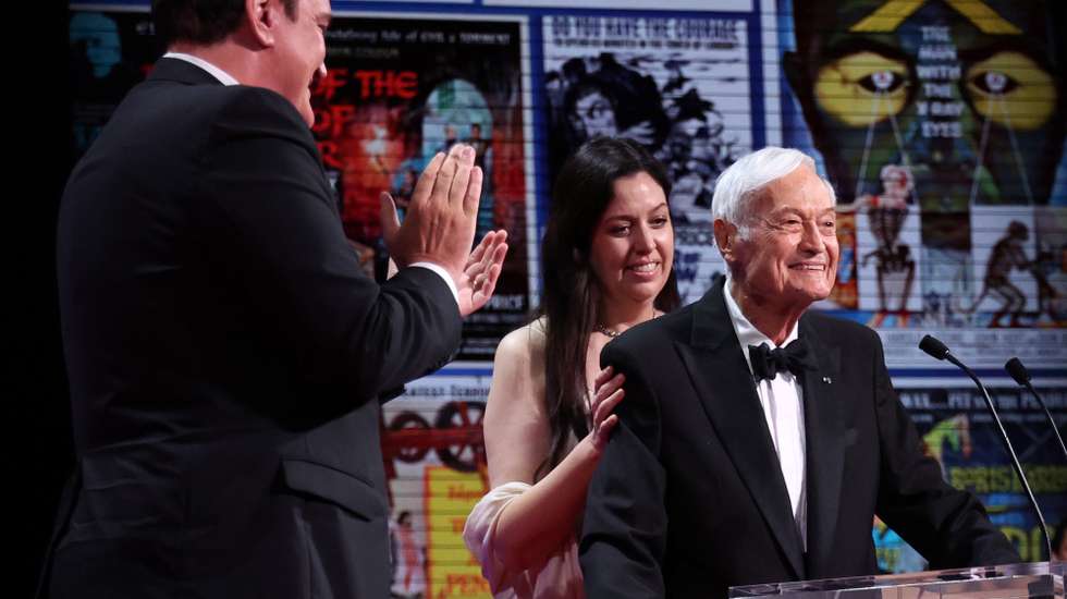 epa10658869 Quentin Tarantino (L) and Roger Corman (R) onstage before presenting the Grand Prix Award during the Closing Ceremony of the 76th annual Cannes Film Festival, in Cannes, France, 27 May 2023.  EPA/MOHAMMED BADRA