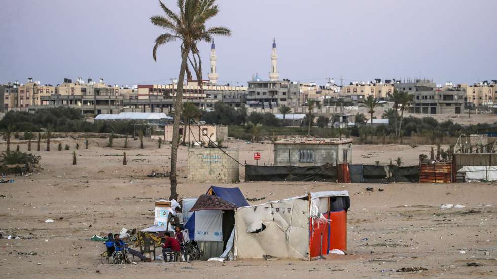 epaselect epa11383108 Palestinians reside near the border fence between the Gaza Strip and Egypt in Rafah, southern Gaza, 31 May 2024. The makeshift camp for internally displaced Palestinians previously located in the area was dismantled by Palestinians following an evacuation order by Israeli forces. The International Court of Justice (ICJ) on 24 May ordered Israel to halt its military operation in Rafah, to open the Rafah border crossing with Egypt to allow for the entry of humanitarian aid, to allow access to Gaza for investigators, and to report to the court within one month on its progress. More than 36,000 Palestinians and over 1,400 Israelis have been killed, according to the Palestinian Health Ministry and the Israel Defense Forces (IDF), since Hamas militants launched an attack against Israel from the Gaza Strip on 07 October 2023, and the Israeli operations in Gaza and the West Bank which followed it.  EPA/MOHAMMED SABER