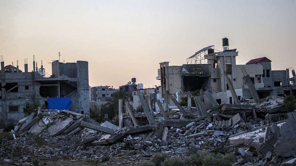epa11496187 Destroyed houses seen during an Israeli military operation in Khan Younis, southern Gaza Strip, 25 July 2024. More than 39,000 Palestinians and over 1,400 Israelis have been killed, according to the Palestinian Health Ministry and the Israel Defense Forces (IDF), since Hamas militants launched an attack against Israel from the Gaza Strip on 07 October 2023, and the Israeli operations in Gaza and the West Bank which followed it.  EPA/MOHAMMED SABER