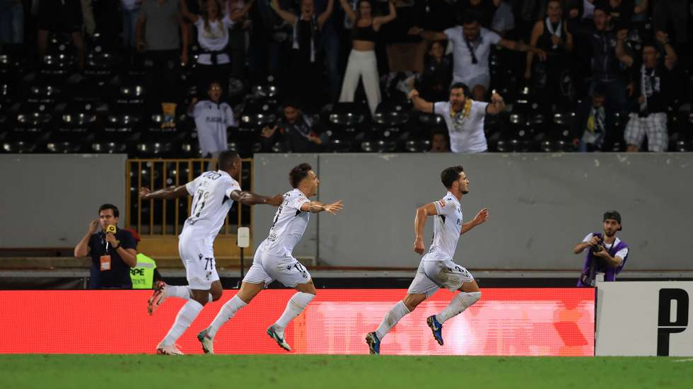 Vitoria de Guimaraes player Tomas Handel (R) celebrates after scoring the 2-1 lead goal during the Portuguese First League soccer match between Vitoria de Guimaraes and Famalicao at D. Afonso Henriques Stadium in Guimaraes, Portugal, 01 September 2024. ESTELA SILVA/LUSA