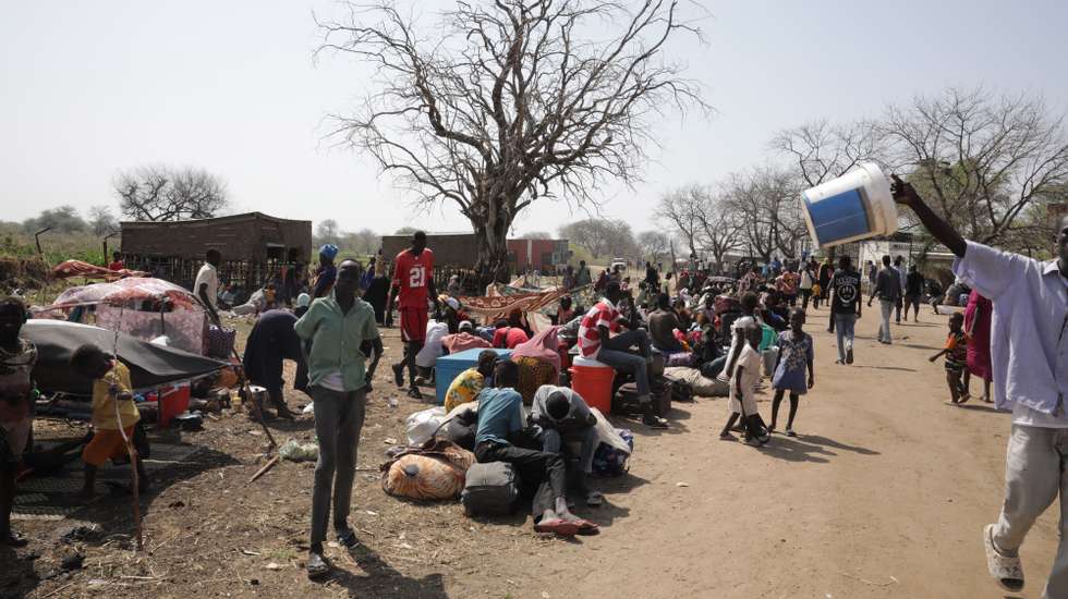 epa10629418 South Sudanese stay in the vicinity of the fluvial port of Renk as they wait to be transported south, in the Upper Nile State town of Renk, South Sudan, 14 May 2023 (issued 15 May 2023). According to Mohajer Mhadi Khalifa, head of the boats union in charge of regulating the transport on the Nile in Renk, five boats are planned to transport the returnees to their areas of origin on the Nile towards the Southern Town of Malakal and other locations. On 14 May 2023 a group of 348 people embarked for the trip, following 577 others who made the same trip the previous day after days of waiting in the fluvial port of Renk. The transport was coordinated and organized by the IOM, Caritas and the RCC (the South Sudanese Relief and Rehabilitation Commission). According to the United Nations, some 200,000 people have fled the conflict in Sudan between 15 April and 12 May 2023. Most of them left towards neighboring countries such as Egypt, Tchad, South Sudan or Ethiopia, and about two million people were internally displaced. Leaving behind them the armed conflict between the Sudanese military and the RSF (Rapid Support Forces) militia, most of the refugees in South Sudan are South Sudanese returnees, part of the some 800,000 who had previously fled the war in South Sudan and who are now returning to a country which is barely out of conflict itself with tensions still remaining in many areas.  EPA/AMEL PAIN ATTENTION: This Image is part of a PHOTO SET