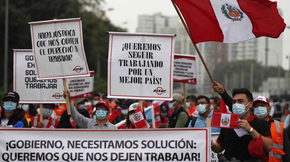 epa09992667 Hundreds of workers in the mining sector protest to demand that the Peruvian government resolve the conflict between the company that manages the large Las Bambas copper mine and the communities in the area in Lima, Peru, 02 June 2022. The conflict has paralyzed operations in the mines and Las Bambas represents the project with the largest investment in the history of Peru. 'We have been 50 days without being able to restart operations. Basically, this march seeks to make the voices of the more than 8,000 workers who are affected heard', Las Bambas legal affairs manager Claudio CÃ¡ceres told Efe.  EPA/Paolo Aguilar
