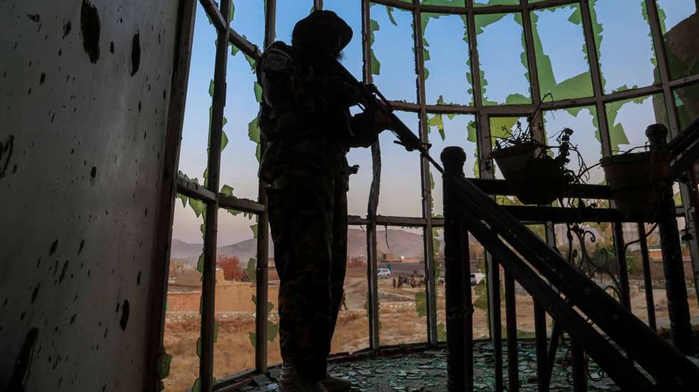 epa09589750 A Taliban inspects the scene of an operation against the IS militants at an IS hideout in the outskirts of Kabul, Afghanistan, 18 November 2021. The operation against the Islamic State in Iraq and Syria - Khorasan (ISIS-K) - the local chapter of the militant group, killed three Daesh (ISIS-K) fighters while one was captured alive. The Taliban have been pursuing a nationwide clearance operation against Daesh for several weeks in Afghanistan and so far have killed or arrested dozens of Daesh fighters in at least eight of the 34 Afghan provinces.  EPA/STRINGER