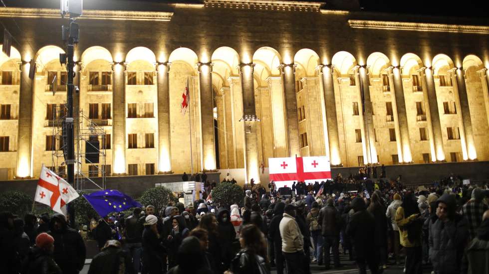 epa11738906 Supporters of Georgian opposition parties gather outside the Georgian Parliament building to protest against the results of the parliamentary election, in Tbilisi, Georgia, 24 November 2024. The first session of the newly elected Georgian Parliament is scheduled for 25 November, Parliament Chairman Shalva Papuashvili announced. On 26 October parliamentary elections were held in Georgia. Around 20 parties competed for seats in the country's highest legislative body, which consists of 150 deputies. The ruling Georgian Dream Party was announced winner of the parliamentary elections.  EPA/DAVID MDZINARISHVILI
