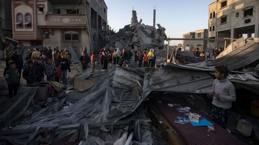 epa11735807 Palestinians inspect the rubble of a destroyed building after an Israeli airstrike, in Khan Yunis, southern Gaza Strip, 23 November 2024. At least six people, including children, were killed and several others injured in Israeli airstrikes overnight, according to medics at Nasser Hospital. More than 44,000 Palestinians and over 1,400 Israelis have been killed, according to the Palestinian Health Ministry and the Israeli Army, since Hamas militants launched an attack against Israel from the Gaza Strip on 07 October 2023, and the Israeli operations in Gaza and the West Bank which followed it.  EPA/HAITHAM IMAD