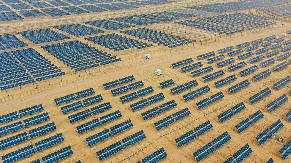 epa10592228 An aerial photo shows photovoltaic panels at Dalat Base in Ordos city, China, 26 April 2023. Dalat Photovoltaic Base was opened in December 2018, jointly built by State Power Investment Corporation, China Guangdong Nuclear Group and China Energy Conservation and Environmental Protection Group. Electricity produced here averaged 0.35 yuan/kwh(0.05 euro/kwh). The base has a horse-shaped pattern made of 196,320 solar panels that was recognized by the Guinness World Records on July 2019 as the world's largest photovoltaic (PV) power station with image-shaped panels.  EPA/WU HAO