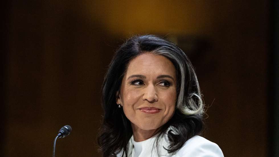 epa11864067 Tulsi Gabbard, nominee for Director of National Intelligence, smiles at Sen. Joni Ernst (R-IA) as she is introduced during her confirmation hearing before the Senate Select Committee on Intelligence on Capitol Hill in Washington, DC, USA, 30 January 2025.  EPA/ANNA ROSE LAYDEN