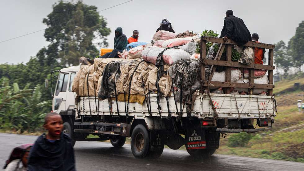 epaselect epa11845365 Refugees ride on a truck with their belongings after leaving the Nzulo internally displaced persons camp and heading for Bulengo, Goma, Democratic Republic of Congo, 22 January 2025. Thousands of people have fled the escalating violence between Rwanda-backed M23 rebels and the Armed Forces of the Democratic Republic of the Congo (FARDC), seeking safety in Bulengo or Goma. According to the UN Refugee Agency (UNHCR), violence in the eastern Democratic Republic of the Congo (DRC) has displaced 237,000 people in 2025.  EPA/MARIE JEANNE MUNYERENKANA