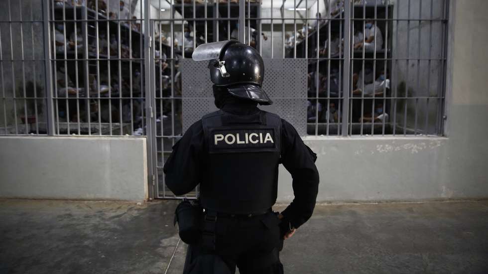 epa12010567 A policeman guards a cell at the Terrorism Confinement Center (Cecot) in Tecoluca, El Salvador, 04 April 2025. Head of Costa Rica's Justice and Peace Ministry, Gerald Campos Valverde, toured the Cecot, El Salvador's maximum security prison, a symbol of President Nayib Bukele's 'war' against gangs, as part of an official visit to the Central American country.  EPA/RODRIGO SURA