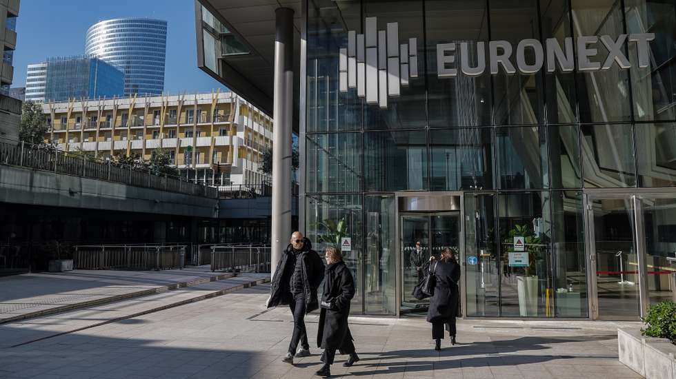 epa11872783 Employees exit the Euronext stock exchange headquarters in the Paris financial district of La Defense, France, 03 February 2025.  EPA/CHRISTOPHE PETIT TESSON