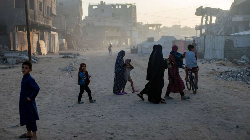 epa12159335 Internally displaced Palestinians leave after performing Eid al-Adha prayers on the ruins of a destroyed mosque, in Khan Yunis camp in the southern Gaza Strip, 06 June 2025. Eid al-Adha is the holiest of the two major Muslim holidays celebrated annually. It marks the yearly Muslim pilgrimage (Hajj) to visit Mecca, the most sacred place in Islam.  EPA/HAITHAM IMAD