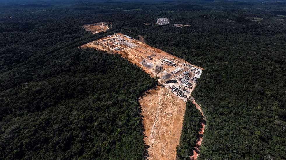 epa11423309 Aerial view shows a deforested area where two Eneva thermoelectric power plants are located in the Amazon rainforest, Brazil, 14 June 2024 (issued 19 June 2024). The extraction of natural gas in the middle of the Brazilian Amazon has put the Mura people on the warpath. While the authorities speak of development for the region, this ethnic group fears for the rivers and forests on which it lives and has initiated a legal struggle to stop the project.  EPA/Antonio Lacerda