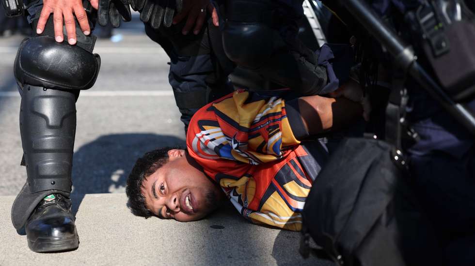 epaselect epa12169355 A protestor is arrested during protests sparked by immigration raids in Los Angeles, California, USA, 10 June 2025. Approximately 2,000 National Guard troops were deployed on 08 June in Los Angeles by US President Donald Trump, though the state of California had not requested any additional assistance, and protests have continued against the Trump administration's immigration enforcement raids over the last couple of days.  EPA/ALLISON DINNER
