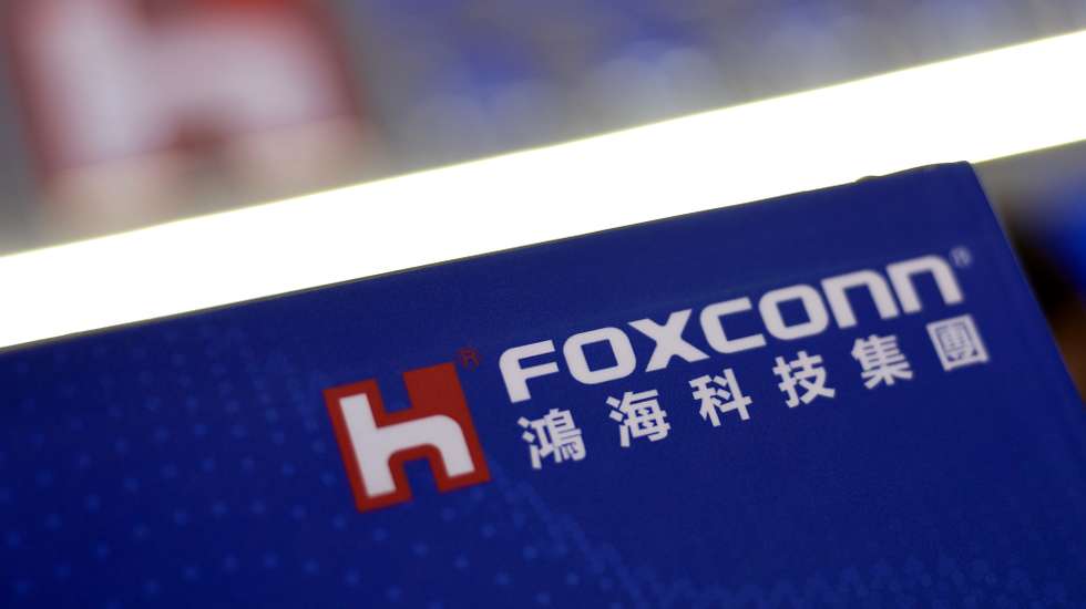 epa11971104 The logo of Taiwanese electronics manufacturer Foxconn is on display during the 2025 Smart City Summit and Expo in Taipei, Taiwan, 18 March 2025. The event takes place from 18 to 21 March in Taipei and from 20 to 22 March in Kaohsiung.  EPA/RITCHIE B. TONGO