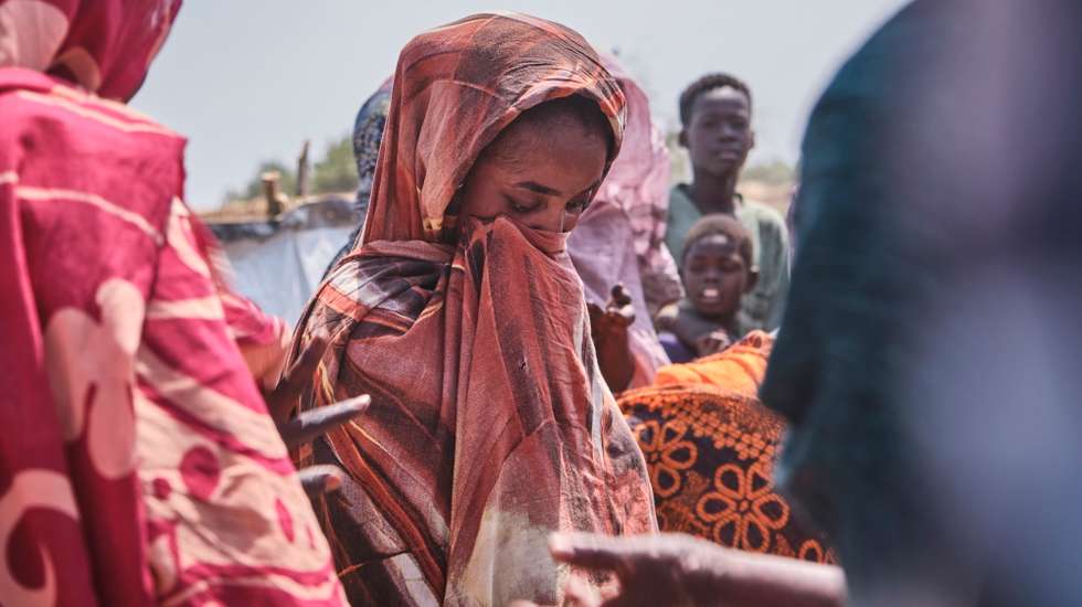 epa11898826 A group of women collect water from the water point set up by Medecins Sans Frontieres, an organisation distributing water tanks for the entire population, in Gerbana, a village 22km from the Sudanese border, South Sudan, 13 February 2025 (issued on 15 February 2025), as  water shortages and diseases resulting from contaminated water have become the community's main complaint. About 110,000 people have arrived in Renk County since December 2024, according to MSF, with 70,000 living in informal settlements such as Gerbana and Atham. There are 975,079 Sudanese refugees in South Sudan, according to UNHCR.  EPA/DIEGO MENJIBAR