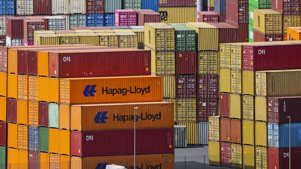 epa12022794 Shipping containers are stacked at the Duisport in Duisburg, Germany, 10 April 2025. US President Trump on 09 April has paused for 90 days the implementation of higher tariffs announced on 02 April for most countries, except China whose tariff has increased to 125 percent.  EPA/CHRISTOPHER NEUNDORF