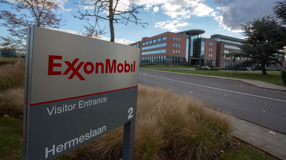 epa03449042 The ExonMobil logo in front of the ExonMobil building in Machelen, Belgium, 27 October 2012. The British oil executive Nicholas Mockford was shot dead on 14 October 2012, outside a restaurant in Brussels earlier this month, the Foreign Office in London said 26 October 2012. British media reports named the victim as Nicholas Mockford, 60, who worked for Exxon Mobil. He was reported to have been attacked as he left a restaurant with his wife in a suburb of the Belgian capital on 14 October. The story emerged only now because of a news blackout in Belgium, media reports said.  EPA/JULIEN WARNAND