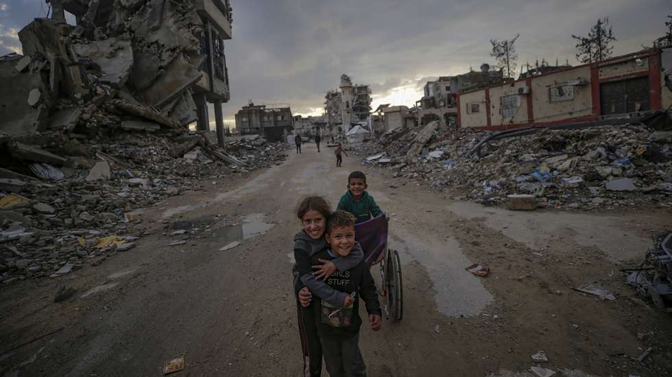 epa12590546 Palestinian children play near their families shelters in Yafa street among the destroyed buildings, in Al Tuffah neighbourhood, east of Gaza City, 13 December 2025, near the yellow line amid a ceasefire between Israel and Hamas. Around 1.9 million people in Gaza, nearly 90 percent of the population, have been displaced since the Israel-Hamas conflict began in October 2023, according to the UN.  EPA/MOHAMMED SABER