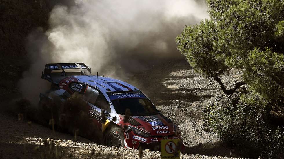 epa13070379 France's Sebastien Ogier and his co-driver Vincent Landais drive their Toyota GR Yaris Rally1,  at SS14 Aghii Theodori 1, as part of the World Rally Championship (WRC), in Aghii Theodori , Peloponnese, Greece, 28 June 2026. World Rally Championship (WRC) takes place from 25-28 June 2026 in Greece.  EPA/VASSILIS PSOMAS