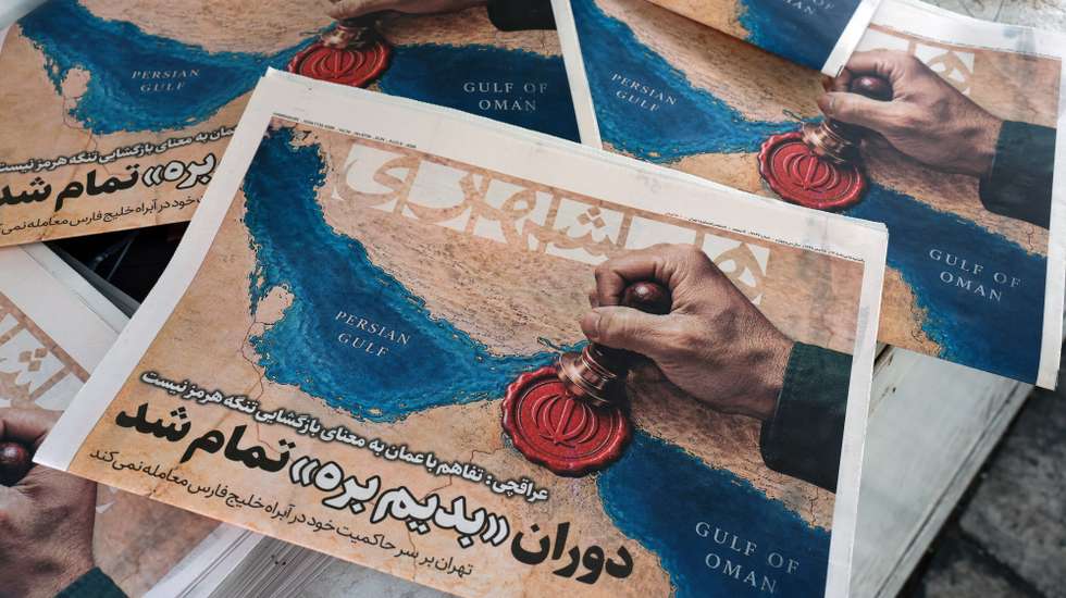 epa13157694 Copies of the Iranian daily newspaper Hamshahri, which features a picture of the Strait of Hormuz and a headline quoting Iranian Foreign Minister Abbas Araghchi: 'The Oman deal doesn’t mean the reopening of the Strait of Hormuz,' are on display outside a kiosk in central Tehran, Iran, 09 August 2026. The Iranian Foreign Ministry stated the agreement with Oman would not imply reopening the Strait of Hormuz without the United States accepting the Iranian proposals.  EPA/ABEDIN TAHERKENAREH RESTRICTIONS: NO Access Israel Media/Persian Language TV Stations Outside Iran/Strictly No Access BBC Persian/VOA Persian/Manoto TV/Iran International TV. (As mandated by Iran's Directorate General for Foreign Media) -- ISRAEL OUT --