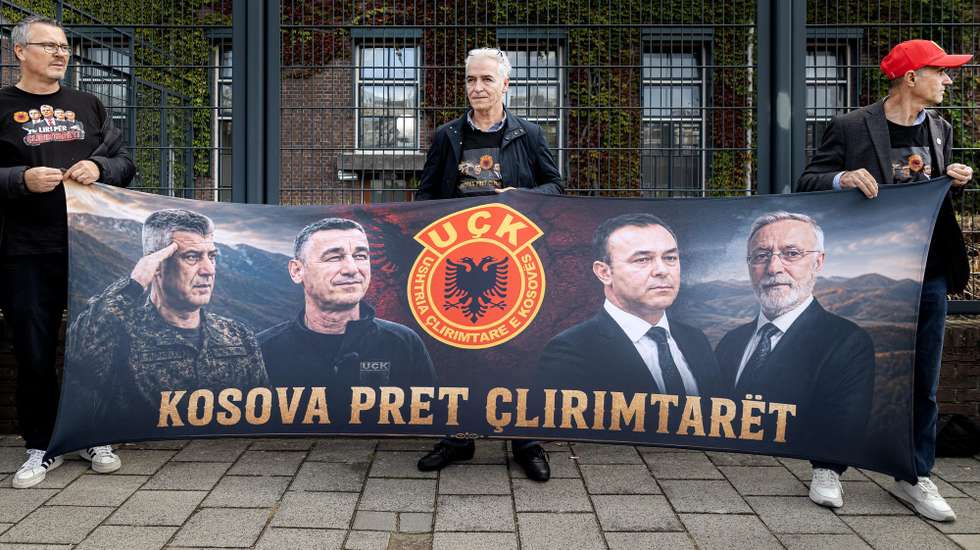 epa13243201 Supporters of former Kosovar President Hashim Thaci stand outside the Kosovo Tribunal, where a verdict is being delivered in the trial of Thaci and three former leaders of the Kosovo Liberation Army (UCK), in The Hague, Netherlands, 16 September 2026. Thaci, on trial at the Kosovo Specialist Chambers in The Hague on charges of war crimes and crimes against humanity allegedly committed during the 1998-1999 Kosovo War, is due to receive a verdict on 16 September 2026.  EPA/RAMON VAN FLYMEN
