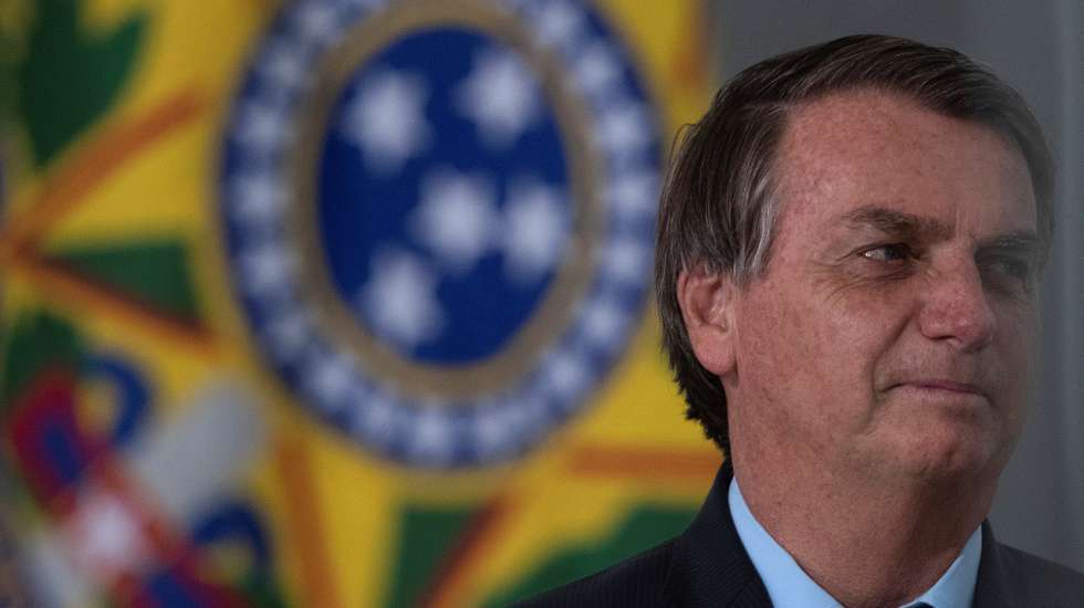 epa08872839 Brazilian President Jair Bolsonaro attends the opening of a meeting on 'Control in the fight of corruption 2020', at the Planalto Palace, in Brasilia, Brazil, 09 December 2020.  EPA/JOEDSON ALVES