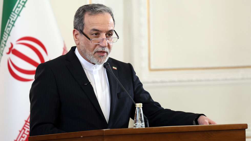 epa12658315 Iranian Foreign Minster Abbas Araghchi speaks during a joint press conference with the Iraqi Foreign Minister in Tehran, Iran, 18 January 2026. Hussein is in Tehran to meet with Iranian officials.  EPA/ABEDIN TAHERKENAREH